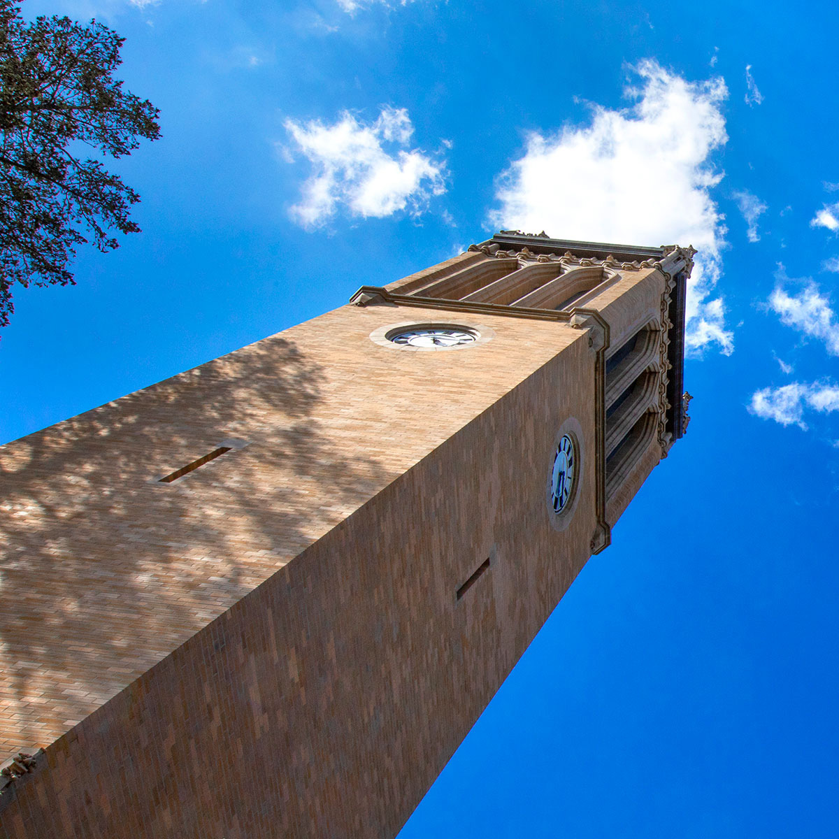 Campanile from below with blue sky background